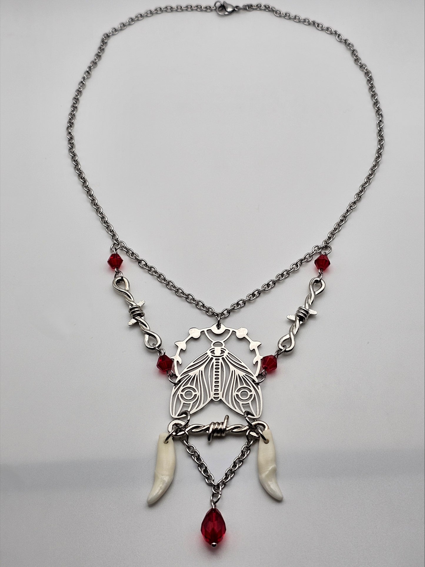 Moth, Wire, and Teeth necklace